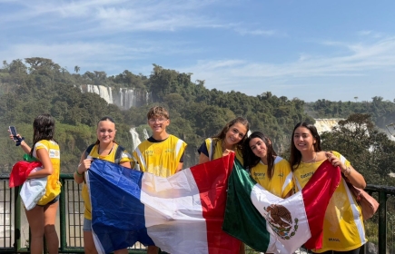 Anna surrounded by the other students on a one-year exchange programme in Brazil